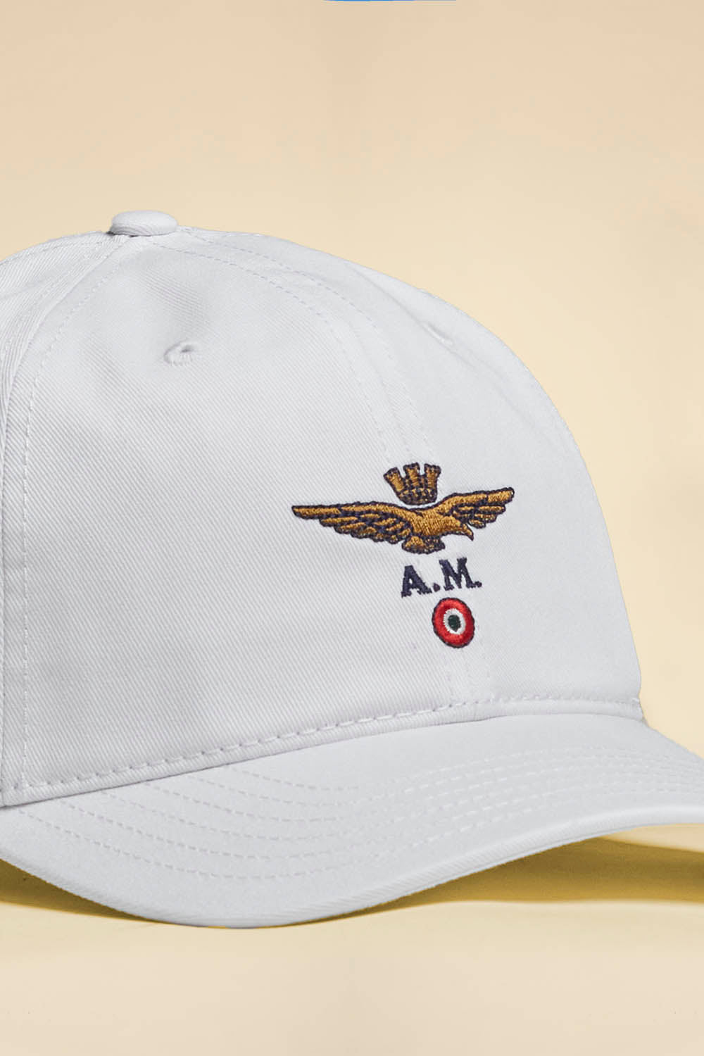 Cappellino con ricamo aquila turrita BIANCO - Pelletteria Domizio